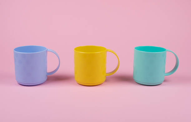 istock Blue, yellow and green cups in a row 1062536254