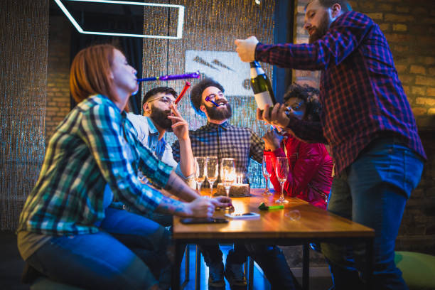 istock Friends  celebrating birthday at pub 1062539152
