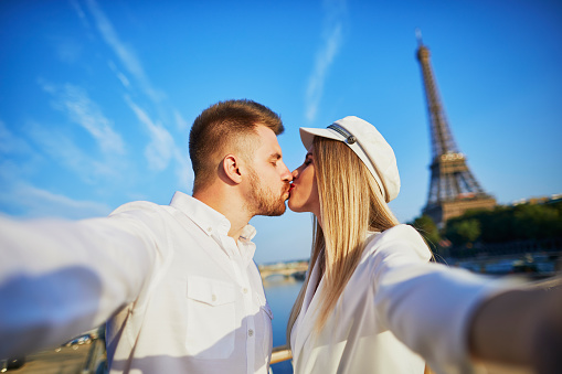 Photo of beautiful still life of Europe dessert, travel to Paris, morning coffee with pieces of sweet chocolate, festive dinner in restaurant, Eiffel tower, honeymoon in France, Valentine day