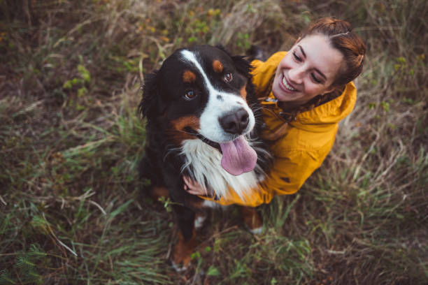 istock Young woman with dog 1062545842