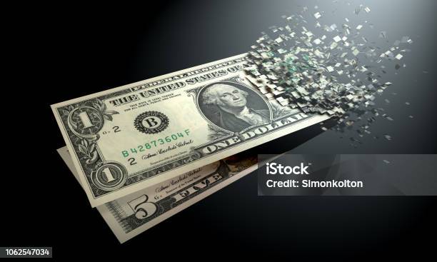 The Dematerialization Of Money Dollars Are Dematerialized On A Black Background Stock Photo - Download Image Now