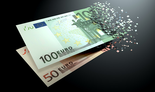 The dematerialization of money, euros are dematerialized on a black background.