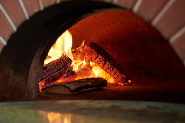 istock fireplace in the brick oven in pizzeria 1062548642