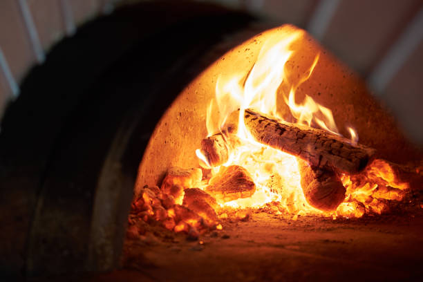 istock fireplace in the brick oven in pizzeria 1062548692