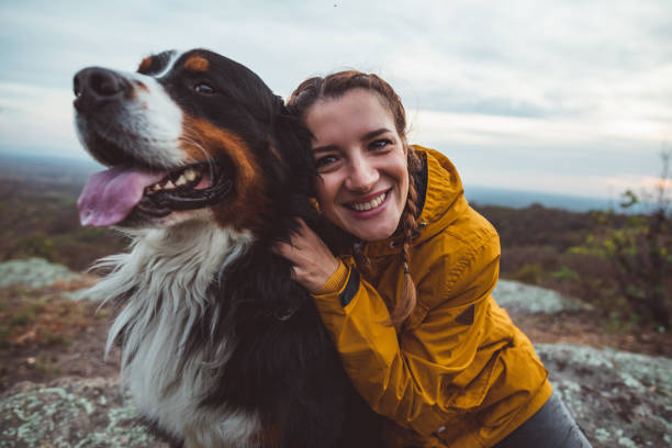istock Young woman with dog 1062549192