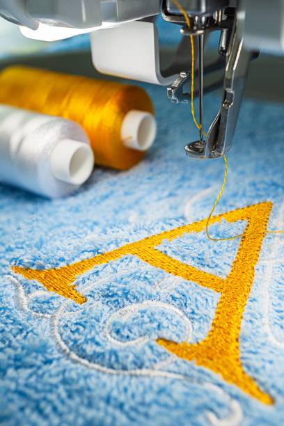 istock Embroidery machine and logo design on towel 1062560496