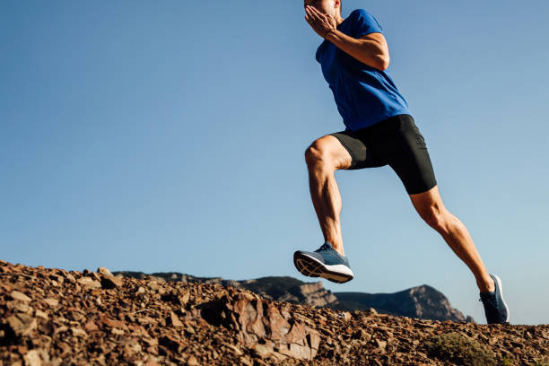 istock men athlete runner running mountain trail 1062562322