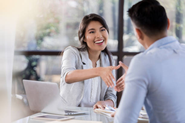 istock Young businesswoman interviews job candidate 1062564566