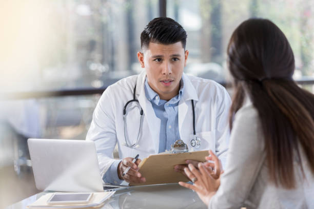 istock Young doctor shares test results with patient 1062564572