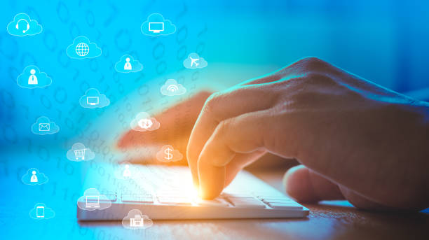 istock Hands of office worker typing on the keyboard, internet services in cloud icons, cloud services concept 1062564710