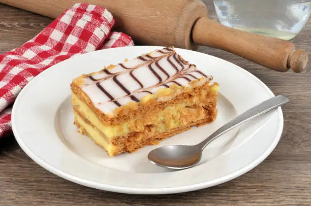 Mille-feuille in a plate placed on a table