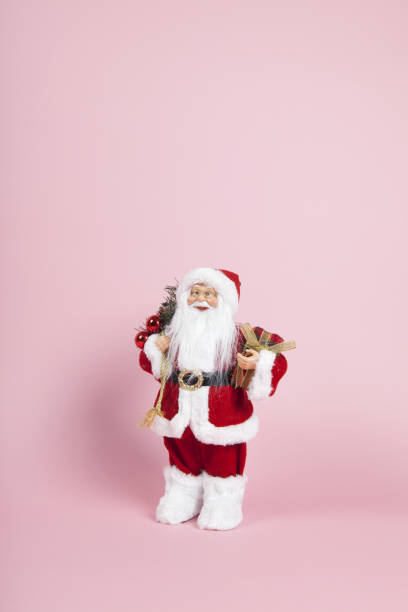 istock Santa Claus pink background 1062565570