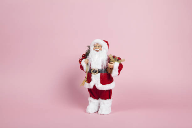 istock Santa Claus pink background 1062565584