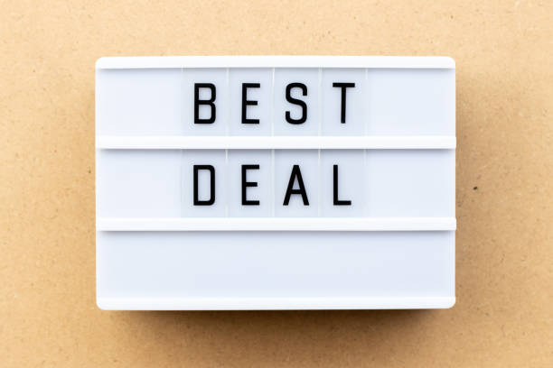 istock Light box with word best deal on wood background 1062570210