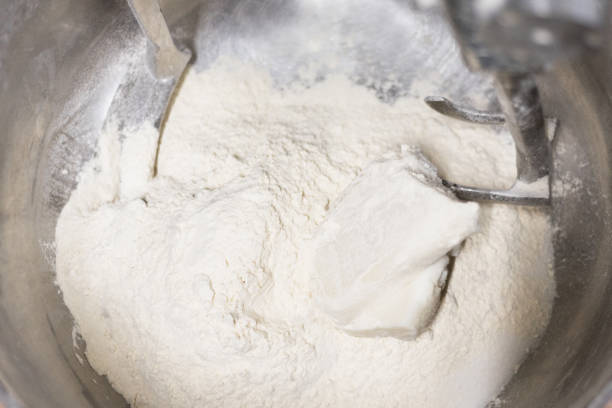 istock Close up of dough in electric bakery mixer 1062575230