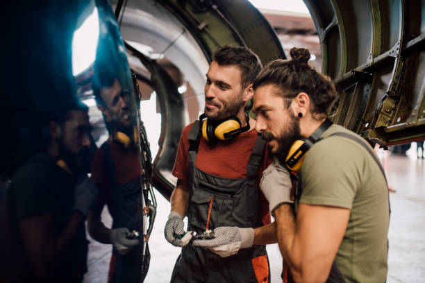 istock Young men repairing aircraft 1062576902