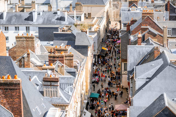 Aerial cityscape view of Rouen, France Aerial citysape view of Rouen with central pedestrian street crowded with people in Normandy, France rue du gros horloge photos stock pictures, royalty-free photos & images