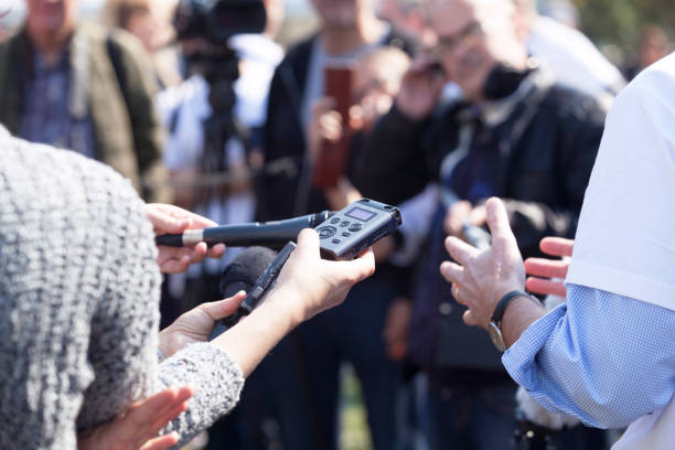 istock Reporters making media interview during press conference 1062588848