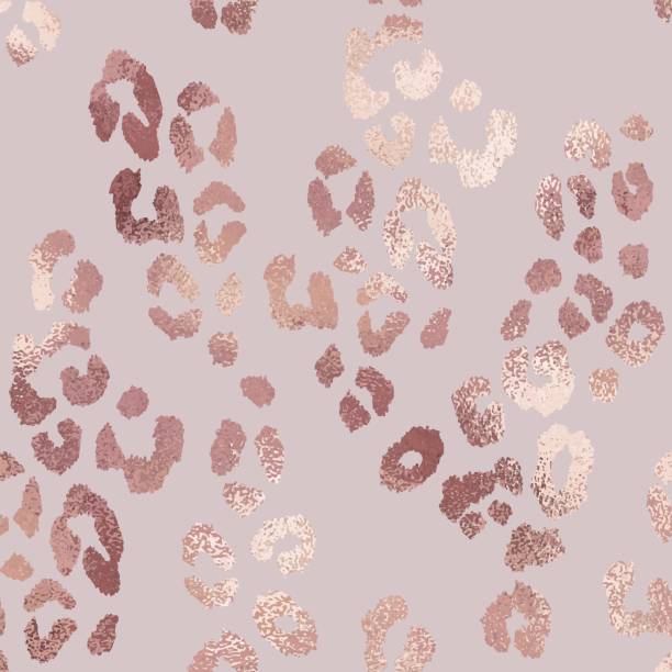 Leopard skin. Rose gold. Texture with foil effect Leopard skin. Rose gold. Elegant texture with foil effect pink gold texture stock illustrations