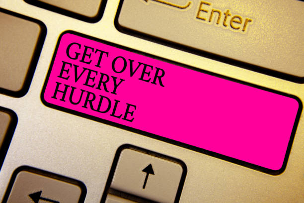 istock Handwriting text Get Over Every Hurdle. Concept meaning Overcome any obstacle problem trouble adversities Crystal orange computer keyboard pink button written texts enter word. 1062607124