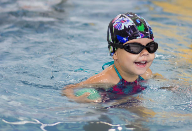 istock child in the swimming pool 1062608134