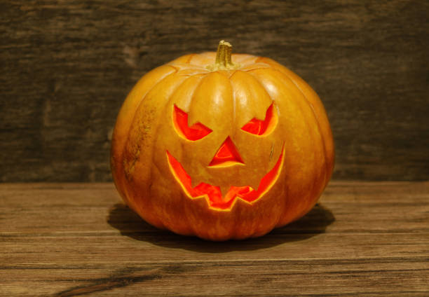 Halloween pumpkin on wooden background