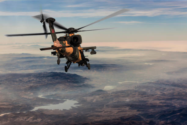 istock Rear view of attack helicopter in flight 1062612336