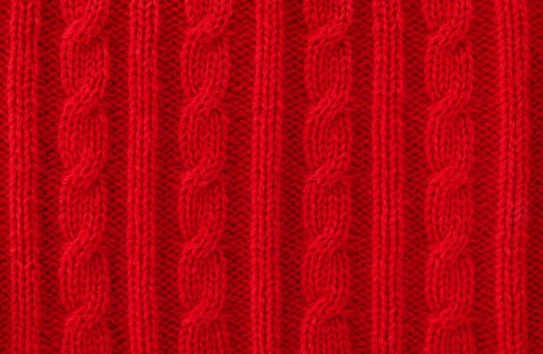 cable rojo cálido fondo de lana de punto - cashmere winter fashion fashion industry fotografías e imágenes de stock