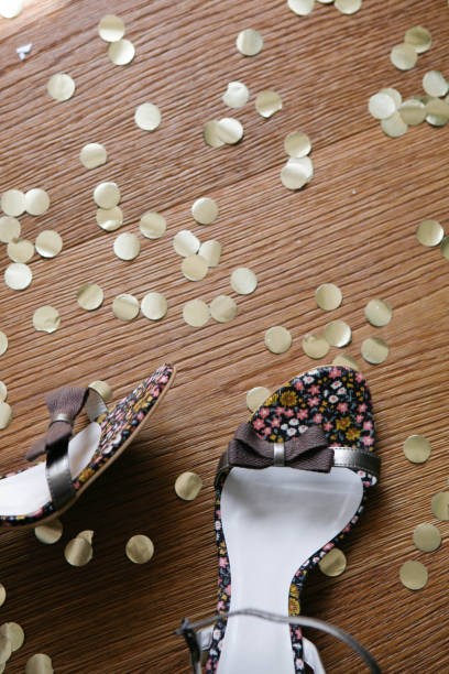 istock Party Shoes on Confetti Covered Floor 1062669826