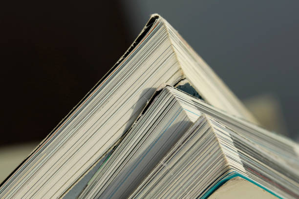 istock Stack of magazine extreme close up with copy space 1062672548