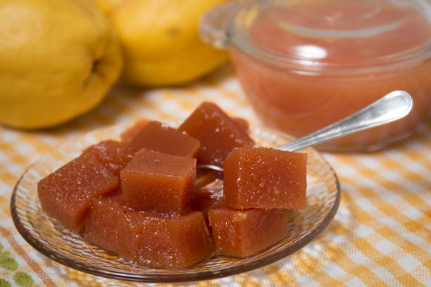 traditional quince jam Close up of traditional quince jam homemade with natural ingredients. cydonia stock pictures, royalty-free photos & images