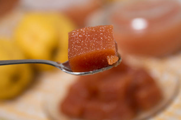 traditional quince jam Close up of traditional quince jam homemade with natural ingredients. cydonia stock pictures, royalty-free photos & images