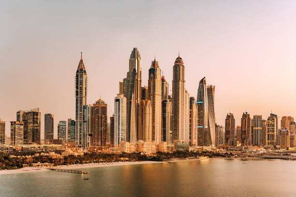 istock Dubai Marina Skyscraper at dusk 1062676468