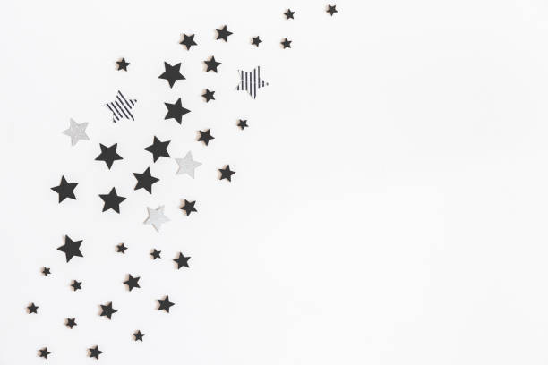 istock Christmas composition. Christmas black and silver decorations on white background. Flat lay, top view, copy space 1062679880