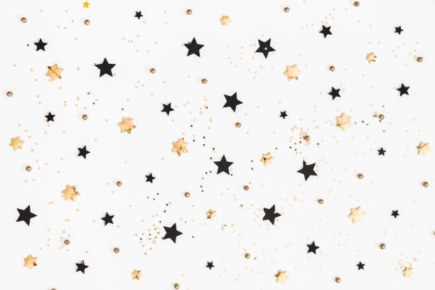istock Christmas composition. Christmas golden and black decorations on white background. Flat lay, top view 1062680298