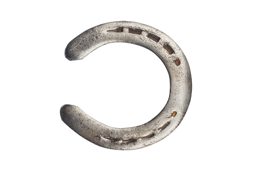 steel polished horseshoe isolated on white