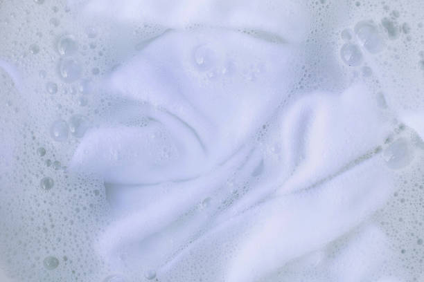 istock Soak a cloth before washing, white cloth 1062686190