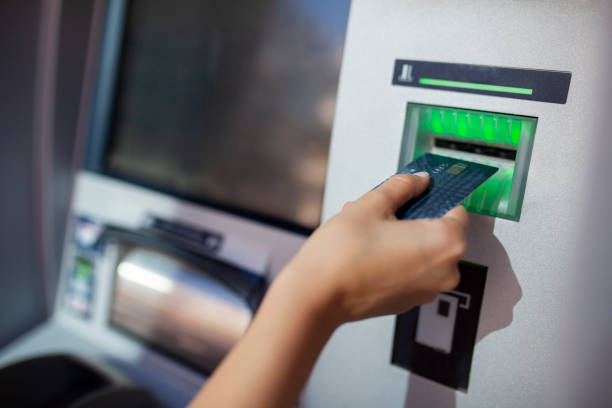 istock Cash dispenser with smartphone 1062688730
