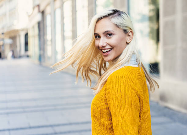 istock Beautiful woman looking back over her shoulder 1062693760