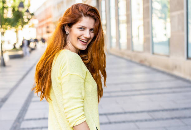 istock Beautiful woman looking back over shoulder 1062693762