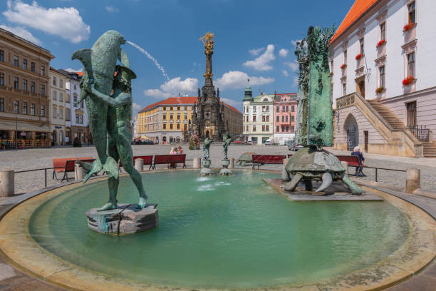 Arion fountain and the Trinity column on Upper square in Olomouc, Czech Republic.