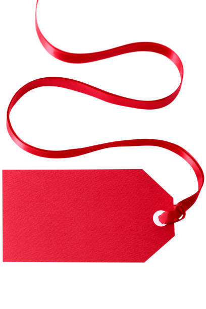 istock Red gift tag or price ticket with ribbon isolated vertical 1062696716