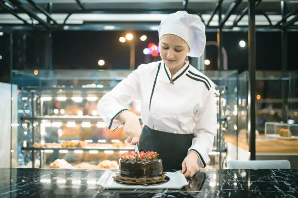 Portrait of woman with pastry chef