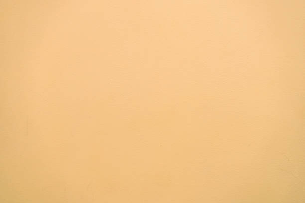 istock The texture of the rough yellow wall 1062726934
