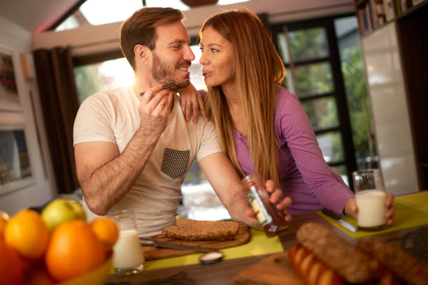 istock Couple at home having a romantic breakfast 1062728470