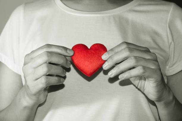 istock Female holding red heart in hands. 1062738160