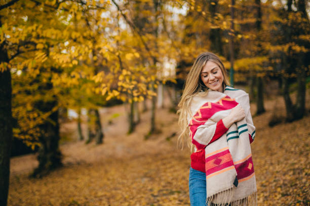 istock Young woman enjoying autumn 1062750874