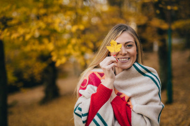 istock Young woman enjoying autumn 1062750948