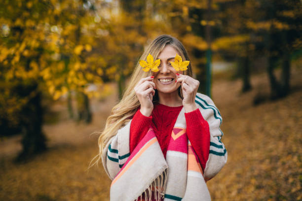 istock Young woman enjoying autumn 1062751014
