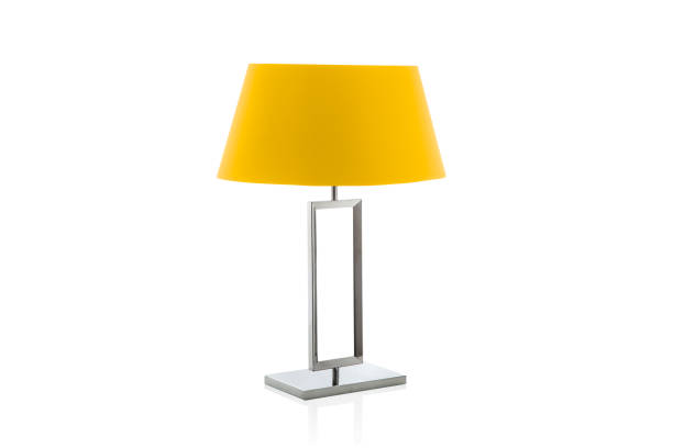 istock Modern table lamp with small salmon lampshade isolated 1062766924